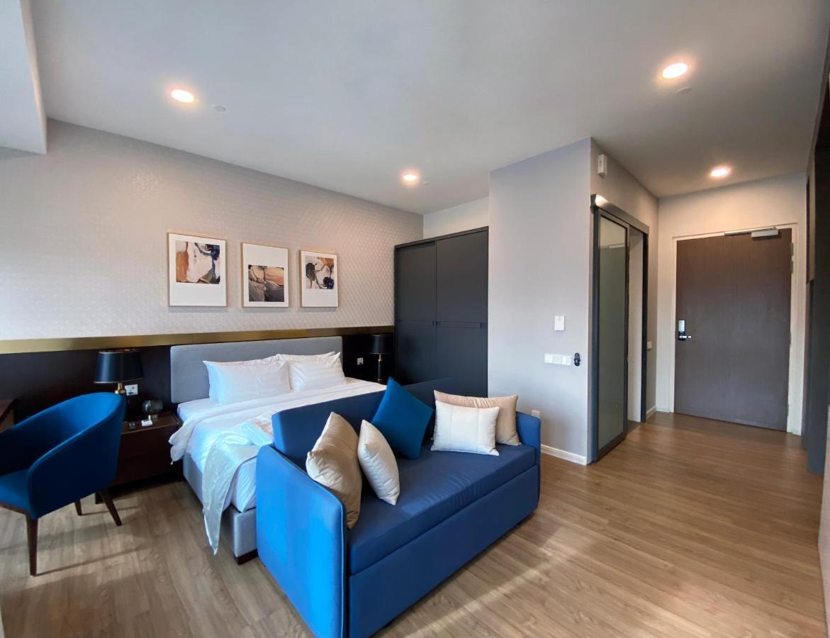 Ceylonz Suites By Mykey Kuala Lumpur Exterior foto A bedroom at the hotel