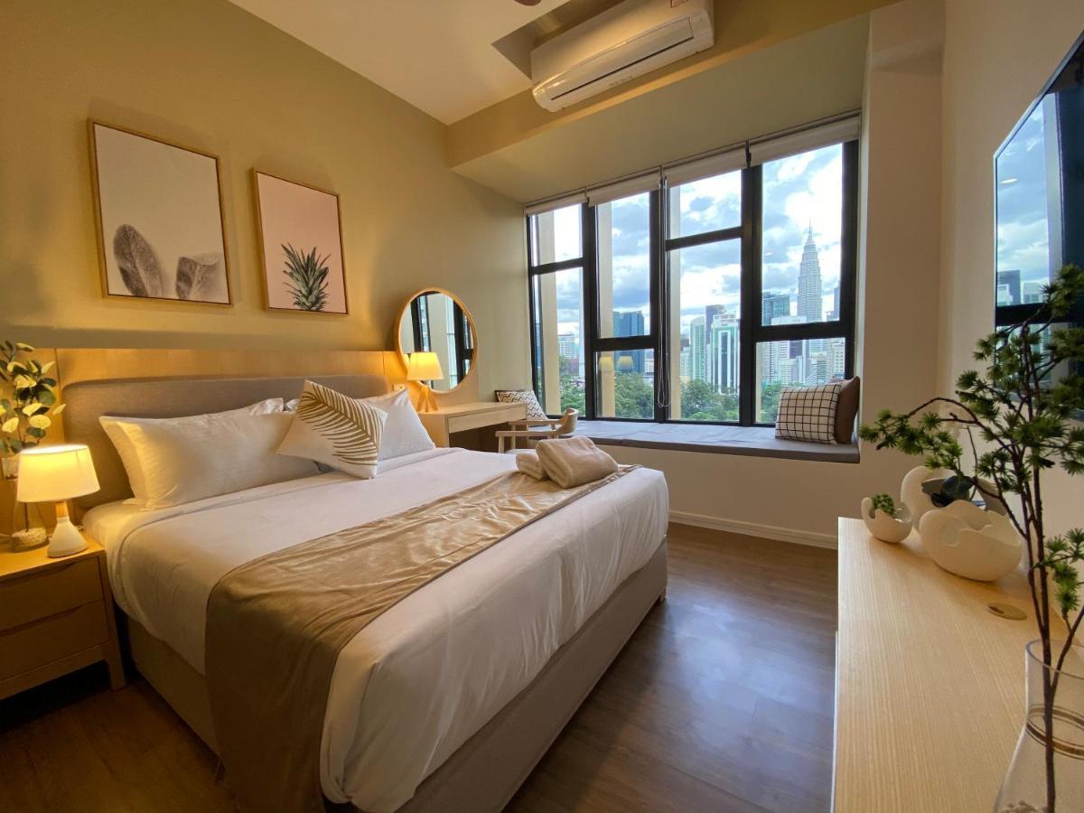 Ceylonz Suites By Mykey Kuala Lumpur Exterior foto A bedroom at the hotel