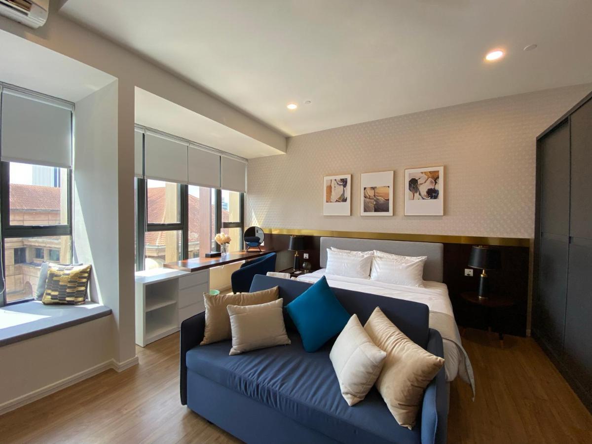 Ceylonz Suites By Mykey Kuala Lumpur Exterior foto A bedroom at the hotel