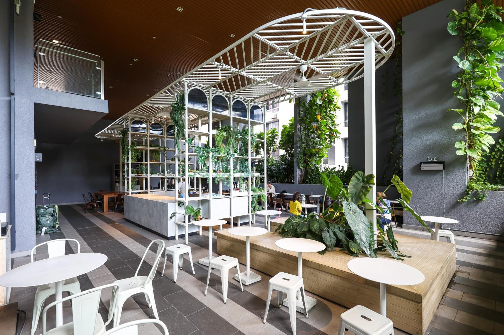Ceylonz Suites By Mykey Kuala Lumpur Exterior foto The interior of a Starbucks Reserve store in Seoul, South Korea